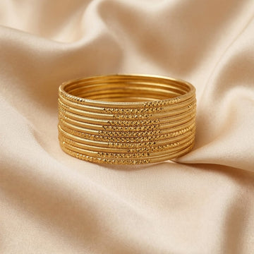 Golden Stack Bangle Set with Diamond-Cut Detailing