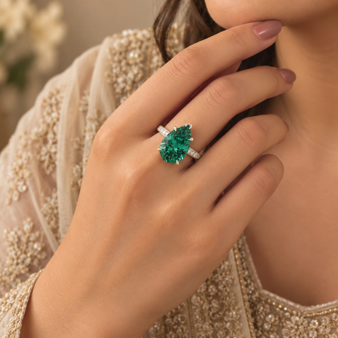 Emerald Teardrop Solitaire Ring with Zircon Band
